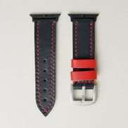Midnight Black full-grain leather watch strap with black stainless steel adapters and silver buckle, featuring red stitching and matching red loops. Markore Hour Line.