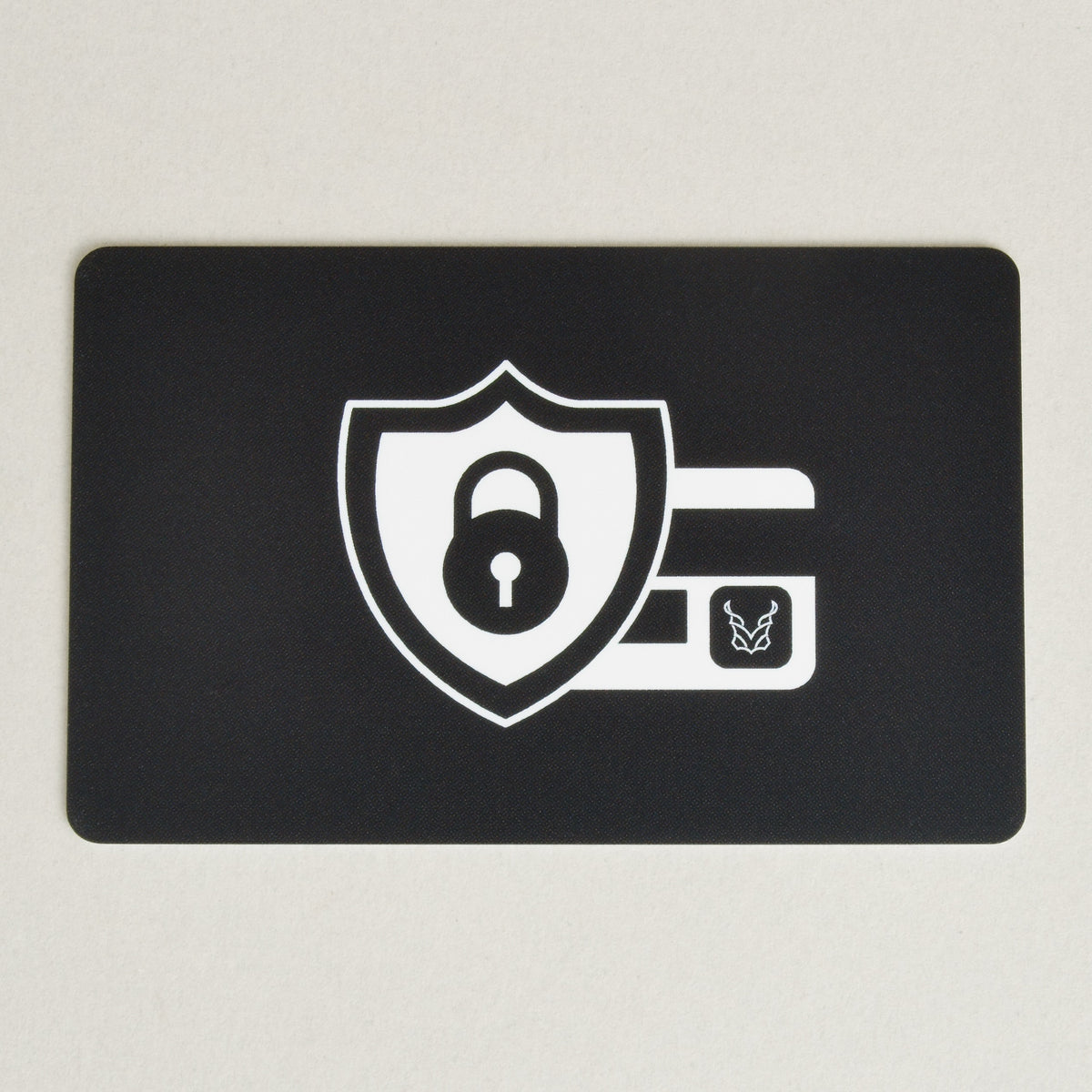 Black RFID block card with a white security shield, lock icon and markore logo.