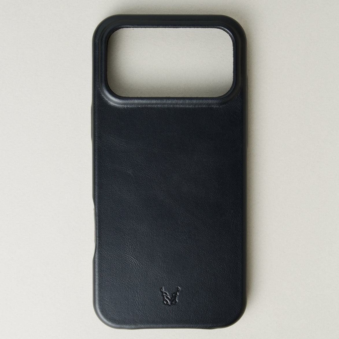 Back view of midnight black leather iphone 17 pro case with full cutout featuring embossed logo. Markore Shell Frame.