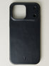 Outside view of midnight black leather iPhone 17 cover showing embossed brand logo. Markore Shell Guard.