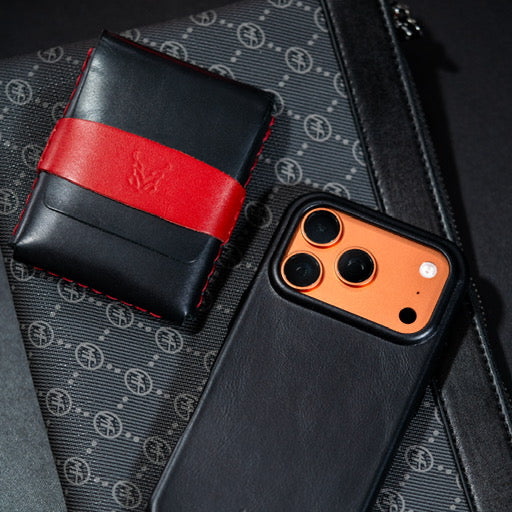 Markore Sutlej Vault and Markore Shell Frame iphone 17 pro case in midnight black lying on canvas bag.